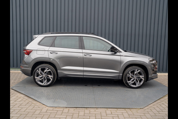 Škoda Karoq 1.5 TSI ACT Sportline Business | Panodak | Trekhaak wegkl. | 360 Camera | 19'' | Elk. A-klep | Prijs Rijklaar!! Škoda Karoq 1.5 TSI ACT Sportline Business | Panodak | Trekhaak wegkl. | 360 Camera | 19'' | Elk. A-klep | Prijs Rijklaar!!