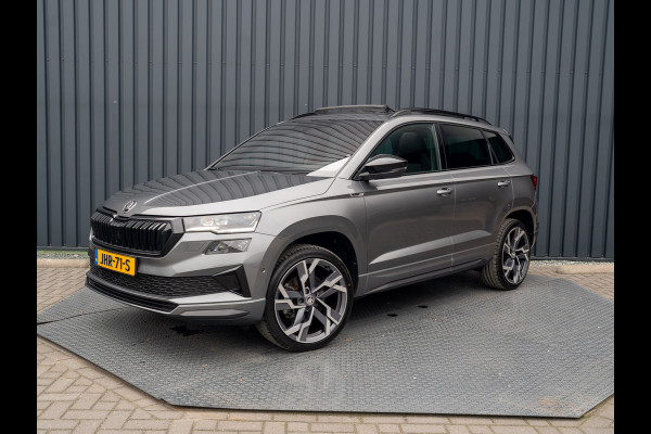 Škoda Karoq 1.5 TSI ACT Sportline Business | Panodak | Trekhaak wegkl. | 360 Camera | 19'' | Elk. A-klep | Prijs Rijklaar!! Škoda Karoq 1.5 TSI ACT Sportline Business | Panodak | Trekhaak wegkl. | 360 Camera | 19'' | Elk. A-klep | Prijs Rijklaar!!