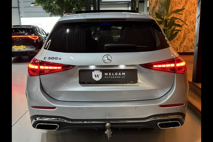 Mercedes-Benz C-Klasse Estate 300 e AMG Line Garantie Trekhaak Massage Pano Ambient 360 Blindspot Elek Achterklep StoelVW Rijklaar