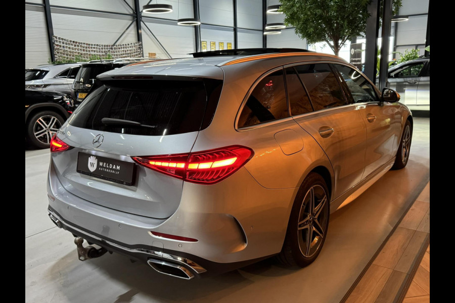 Mercedes-Benz C-Klasse Estate 300 e AMG Line Garantie Trekhaak Massage Pano Ambient 360 Blindspot Elek Achterklep StoelVW Rijklaar