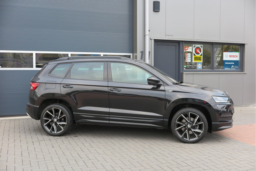 Škoda Karoq 1.5 TSI ACT 150pk Sportline Business Stoelverwarming , Led verlichting , DAB+ radio , Carplay ,Canton sound systeem, Achteruitrijcamera , Parkeersensoren ,Electr. achterklep ,etc. Škoda Karoq 1.5 TSI ACT 150pk Sportline Business Stoelverwarming , Led verlichting , DAB+ radio , Carplay ,Canton sound systeem, Achteruitrijcamera , Parkeersensoren ,Electr. achterklep ,etc.