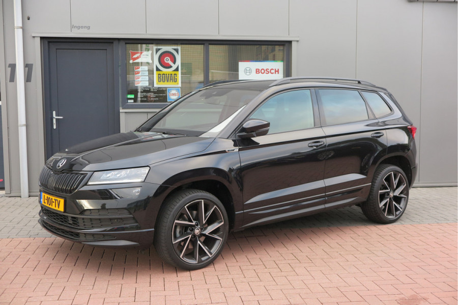 Škoda Karoq 1.5 TSI ACT 150pk Sportline Business Stoelverwarming , Led verlichting , DAB+ radio , Carplay ,Canton sound systeem, Achteruitrijcamera , Parkeersensoren ,Electr. achterklep ,etc. Škoda Karoq 1.5 TSI ACT 150pk Sportline Business Stoelverwarming , Led verlichting , DAB+ radio , Carplay ,Canton sound systeem, Achteruitrijcamera , Parkeersensoren ,Electr. achterklep ,etc.