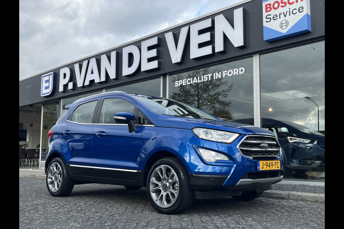 Ford EcoSport 1.0 EcoBoost Titanium 125pk/92kW 6-bak | Trekhaak | 17 inch | Navigatie | Camera | Half leder | Ambient Light | etc. etc. Ford EcoSport 1.0 EcoBoost Titanium 125pk/92kW 6-bak | Trekhaak | 17 inch | Navigatie | Camera | Half leder | Ambient Light | etc. etc.