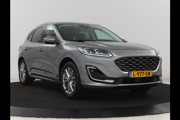 Ford Kuga 2.5 PHEV Vignale | Head-Up | Trekhaak | Adaptive cruise | Leder | 360 Camera | Stoelverwarming | Digital Cockpit | Carplay | Dodehoek detectie | Navigatie | Keyless | Achterbankverwarming | Plug In Ford Kuga 2.5 PHEV Vignale | Head-Up | Trekhaak | Adaptive cruise | Leder | 360 Camera | Stoelverwarming | Digital Cockpit | Carplay | Dodehoek detectie | Navigatie | Keyless | Achterbankverwarming | Plug In