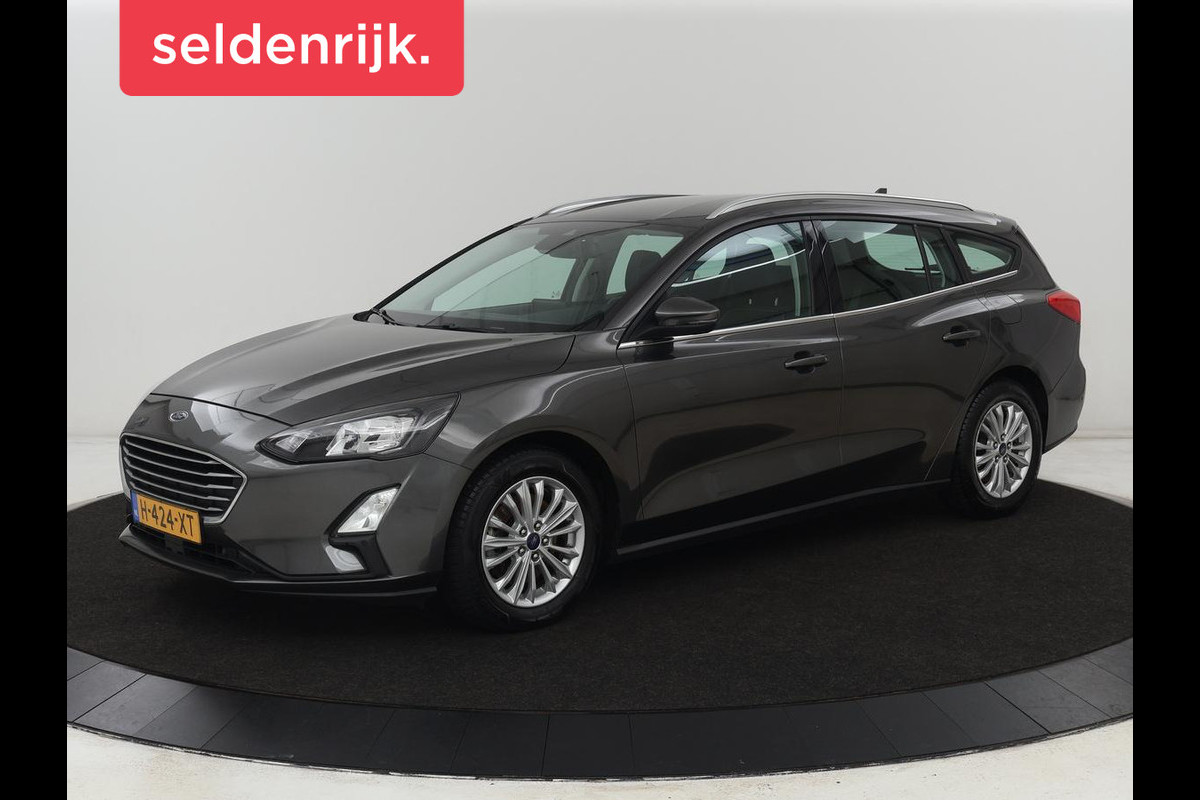 Ford Focus 1.0 EcoBoost Titanium | Trekhaak | Carplay | Navigatie | Keyless | Full LED | Parkeerhulp | Climate control | Cruise control Ford Focus 1.0 EcoBoost Titanium | Trekhaak | Carplay | Navigatie | Keyless | Full LED | Parkeerhulp | Climate control | Cruise control