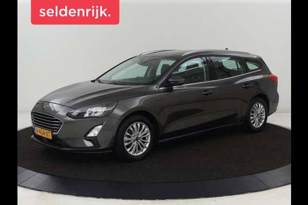 Ford Focus 1.0 EcoBoost Titanium | Trekhaak | Carplay | Navigatie | Keyless | Full LED | Parkeerhulp | Climate control | Cruise control Ford Focus 1.0 EcoBoost Titanium | Trekhaak | Carplay | Navigatie | Keyless | Full LED | Parkeerhulp | Climate control | Cruise control