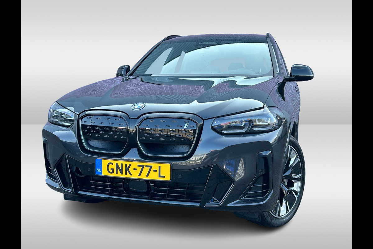 BMW iX3 High Executive Edition 80 kWh / Trekhaak / Panoramadak / 360Camera / Head-up / 20'' / Leder / Harman Kardon / Sfeerverlichting / Dodehoek / DAB / Stuur+Stoelverwarming / ACC BMW iX3 High Executive Edition 80 kWh / Trekhaak / Panoramadak / 360Camera / Head-up / 20'' / Leder / Harman Kardon / Sfeerverlichting / Dodehoek / DAB / Stuur+Stoelverwarming / ACC