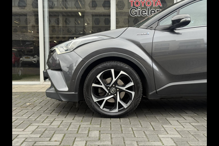 Toyota C-HR 1.8 Hybrid Bi-Tone Plus | Leer, Stoel + Stuurverwarming, Navigatie, Dodehoekherkenning, Parkeersensoren Toyota C-HR 1.8 Hybrid Bi-Tone Plus | Leer, Stoel + Stuurverwarming, Navigatie, Dodehoekherkenning, Parkeersensoren