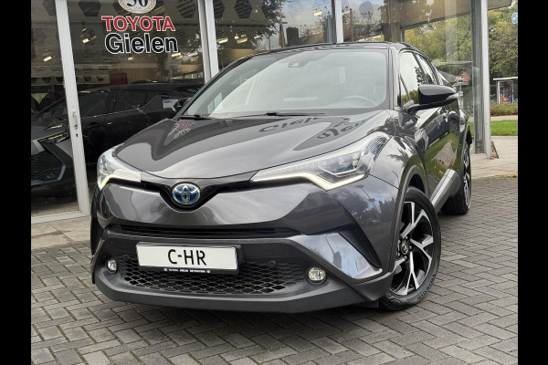 Toyota C-HR 1.8 Hybrid Bi-Tone Plus | Leer, Stoel + Stuurverwarming, Navigatie, Dodehoekherkenning, Parkeersensoren Toyota C-HR 1.8 Hybrid Bi-Tone Plus | Leer, Stoel + Stuurverwarming, Navigatie, Dodehoekherkenning, Parkeersensoren