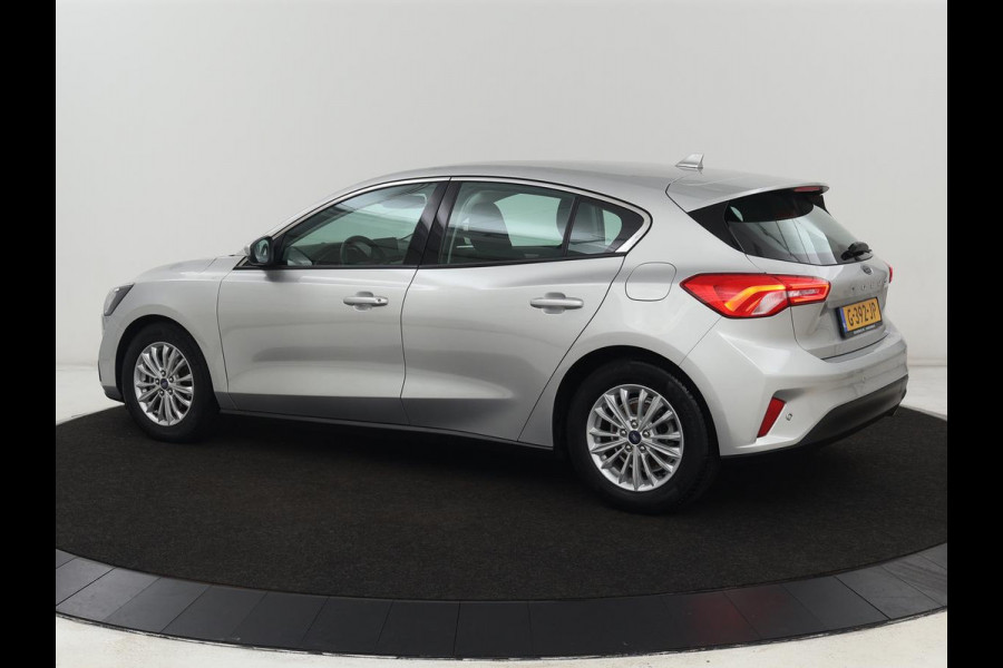 Ford Focus 1.0 EcoBoost Titanium | Automaat | Carplay | Navigatie | Keyless | Parkeerhulp | Climate control | Cruise control | Bluetooth Ford Focus 1.0 EcoBoost Titanium | Automaat | Carplay | Navigatie | Keyless | Parkeerhulp | Climate control | Cruise control | Bluetooth