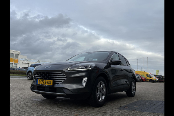 Ford Kuga 1.5 EcoBoost Titanium 150pk | Head Up Display | Matrix LED | Winterpack | Trekhaak | 1.800kg Trekgewicht Ford Kuga 1.5 EcoBoost Titanium 150pk | Head Up Display | Matrix LED | Winterpack | Trekhaak | 1.800kg Trekgewicht