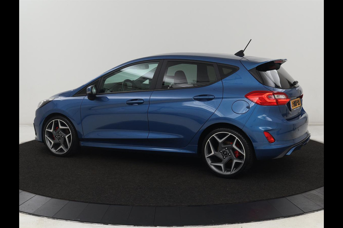 Ford Fiesta 1.5 EcoBoost ST-3 | Origineel NL | 1e eigenaar | Stoelverwarming | B&O Sound | Half leder | Carplay | Navigatie | Stuurverwarming | Full LED | Parkeerhulp Ford Fiesta 1.5 EcoBoost ST-3 | Origineel NL | 1e eigenaar | Stoelverwarming | B&O Sound | Half leder | Carplay | Navigatie | Stuurverwarming | Full LED | Parkeerhulp