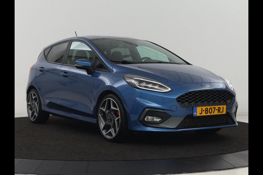 Ford Fiesta 1.5 EcoBoost ST-3 | Origineel NL | 1e eigenaar | Stoelverwarming | B&O Sound | Half leder | Carplay | Navigatie | Stuurverwarming | Full LED | Parkeerhulp Ford Fiesta 1.5 EcoBoost ST-3 | Origineel NL | 1e eigenaar | Stoelverwarming | B&O Sound | Half leder | Carplay | Navigatie | Stuurverwarming | Full LED | Parkeerhulp