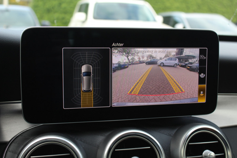 Mercedes-Benz C-Klasse Estate 180 Business Solution AMG / Panoramadak / Camera / Leder / Navigatie / 18'' / DAB / Stoelverwarming / Cruise Control Mercedes-Benz C-Klasse Estate 180 Business Solution AMG / Panoramadak / Camera / Leder / Navigatie / 18'' / DAB / Stoelverwarming / Cruise Control