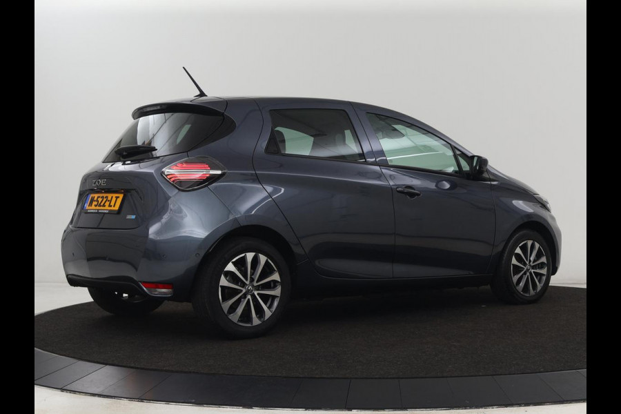 Renault ZOE R135 Intens 52 kWh | Warmtepomp | Carplay | Camera | Half leder | Keyless | Navigatie | Climate control | DAB | Cruise control Renault ZOE R135 Intens 52 kWh | Warmtepomp | Carplay | Camera | Half leder | Keyless | Navigatie | Climate control | DAB | Cruise control