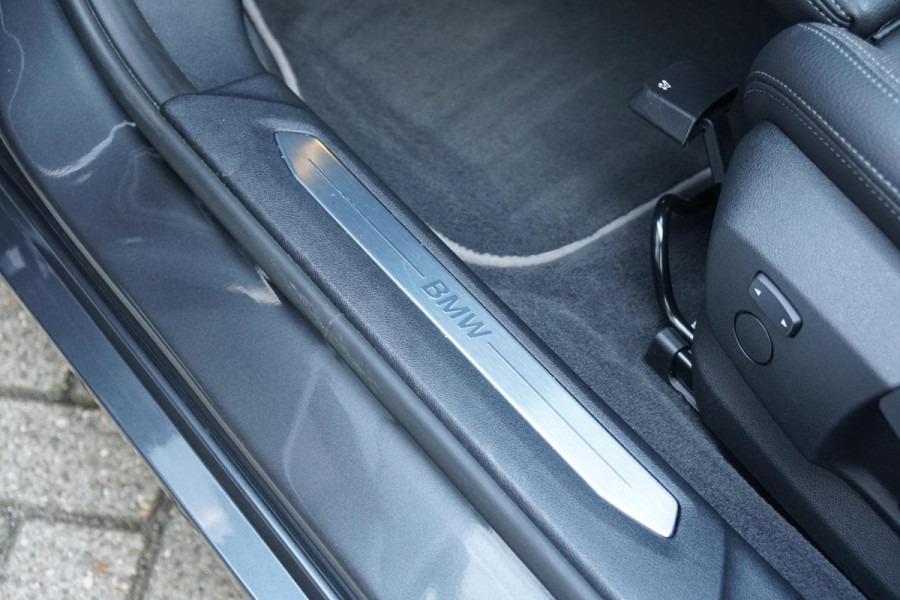 BMW 1-serie 118i Executive Edition + HARMAN KARDON / CAMERA / STOELVERWARMING