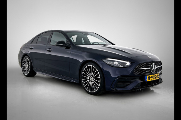 Mercedes-Benz C-Klasse 180 AMG Line Multispaaks lichtmetalen velgen 19 inch. Navigatie | parking support met camera achter | Inclusief 24 maanden MB Certified garantie voor Europa. Mercedes-Benz C-Klasse 180 AMG Line Multispaaks lichtmetalen velgen 19 inch. Navigatie | parking support met camera achter | Inclusief 24 maanden MB Certified garantie voor Europa.