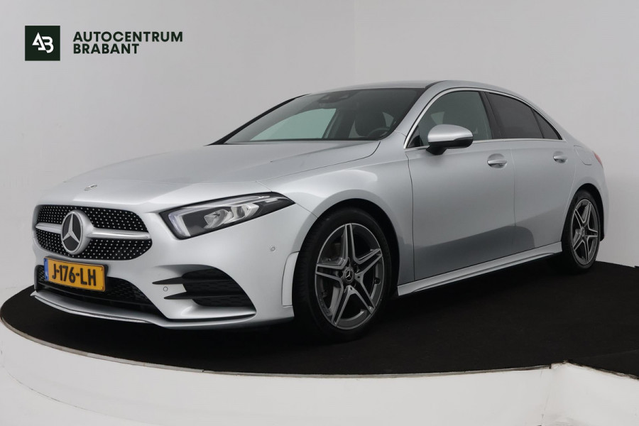 Mercedes-Benz A-Klasse 180 Business Solution AMG (STOELVERWARMING, SFEERVERLICHTING, ACHTERUITRIJCAMERA, CRUISE CONTROL, NAVI)