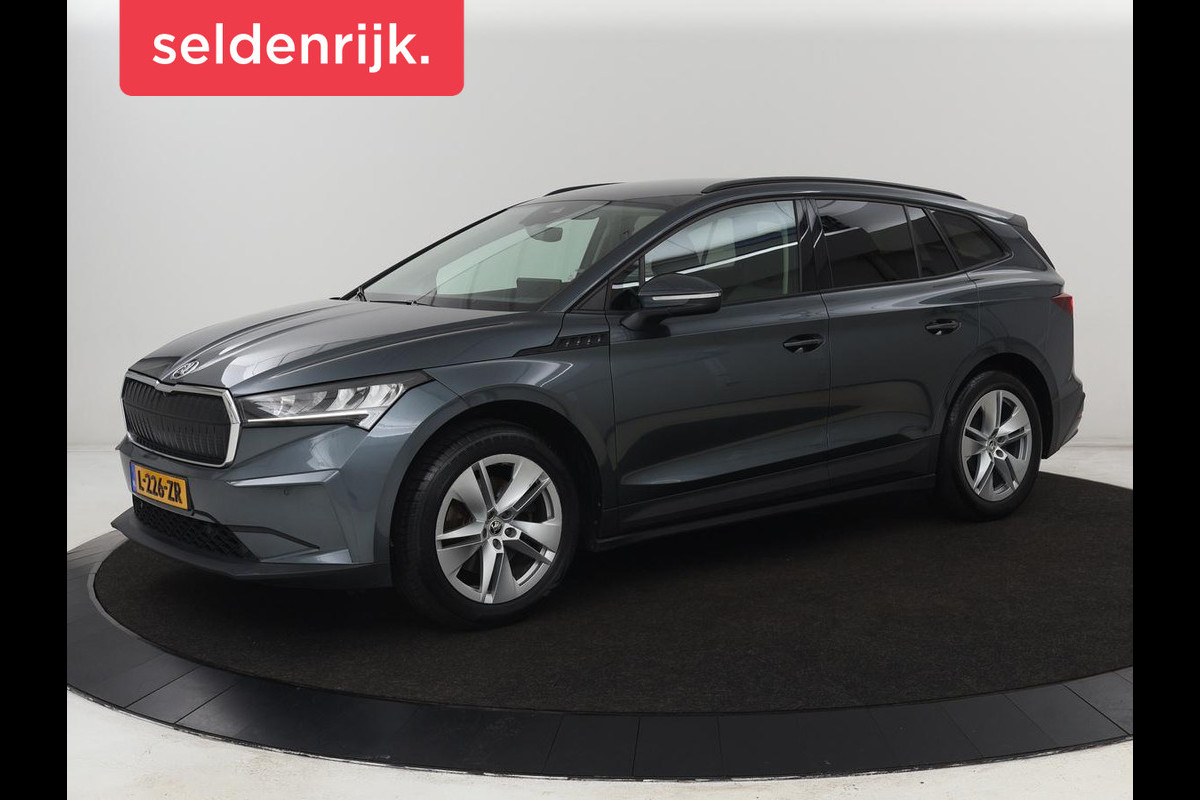Škoda ENYAQ iV 60 | Trekhaak | Adaptive cruise | Camera | Keyless | Stuurverwarming | Half leder | 19'' | Carplay | Navigatie | Digital Cockpit | Full LED | File Assistent | Parkeerhulp Škoda ENYAQ iV 60 | Trekhaak | Adaptive cruise | Camera | Keyless | Stuurverwarming | Half leder | 19'' | Carplay | Navigatie | Digital Cockpit | Full LED | File Assistent | Parkeerhulp