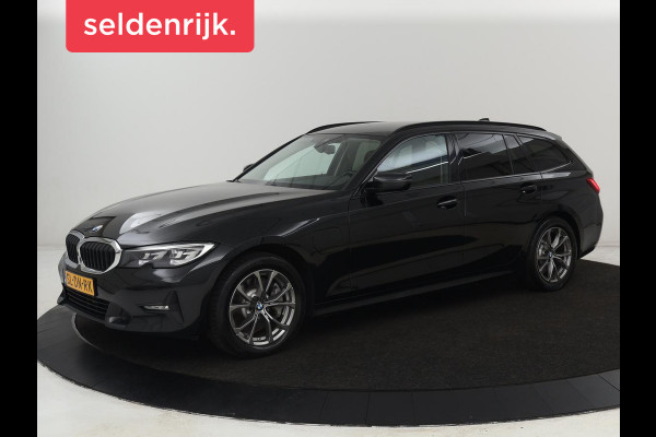 BMW 3 Serie Touring 330e | Trekhaak | Half Leder | Stoel & Stuurverwarming | Sfeerverlichting | Carplay | Sportstoelen | Navigatie | Cruise Control | Parkeerhulp | Live Cockpit | PHEV | Plug In