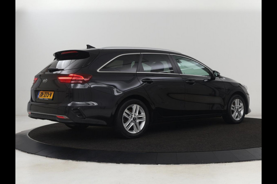 Kia Ceed 1.0 T-GDi DynamicPlusLine | Trekhaak | Stoel & stuurverwarming | Camera | Carplay | Navigatie | Climate control | Parkeerhulp | Cruise control | Half leder Kia Ceed 1.0 T-GDi DynamicPlusLine | Trekhaak | Stoel & stuurverwarming | Camera | Carplay | Navigatie | Climate control | Parkeerhulp | Cruise control | Half leder