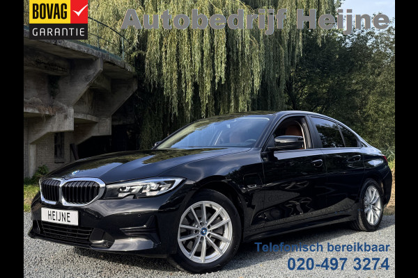 BMW 3-serie 320e BUSINESS+ EDITION LEDER/CAMERA/TREKHAAK BMW 3-serie 320e BUSINESS+ EDITION LEDER/CAMERA/TREKHAAK