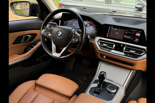 BMW 3-serie 320e BUSINESS+ EDITION LEDER/CAMERA/TREKHAAK BMW 3-serie 320e BUSINESS+ EDITION LEDER/CAMERA/TREKHAAK