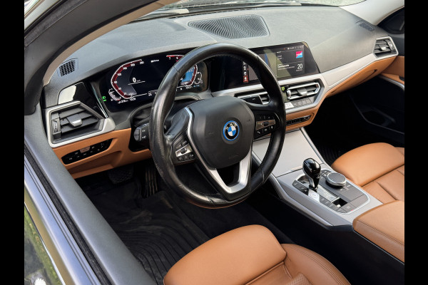 BMW 3-serie 320e BUSINESS+ EDITION LEDER/CAMERA/TREKHAAK BMW 3-serie 320e BUSINESS+ EDITION LEDER/CAMERA/TREKHAAK