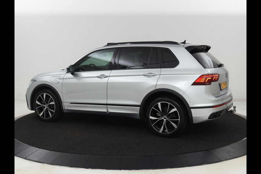 Volkswagen Tiguan 1.4 TSI eHybrid R-Line | Panoramadak | Leder | Trekhaak | 360 Camera | Sfeerverlichting | Adaptive cruise | 20'' | Carplay | Adaptief onderstel | Matrix LED | Park Assist | PHEV | Plug In Volkswagen Tiguan 1.4 TSI eHybrid R-Line | Panoramadak | Leder | Trekhaak | 360 Camera | Sfeerverlichting | Adaptive cruise | 20'' | Carplay | Adaptief onderstel | Matrix LED | Park Assist | PHEV | Plug In