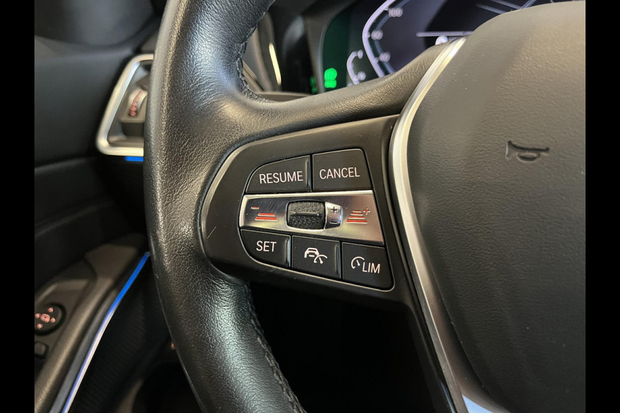 BMW 3 Serie Touring 320e Sportline Aut-8 Panoramadak Head Up Display Laser Licht Adaptive Cruise Trekhaak Leder Navi Parkeer Sensoren
