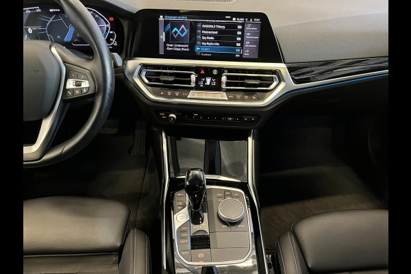 BMW 3 Serie Touring 320e Sportline Aut-8 Panoramadak Head Up Display Laser Licht Adaptive Cruise Trekhaak Leder Navi Parkeer Sensoren