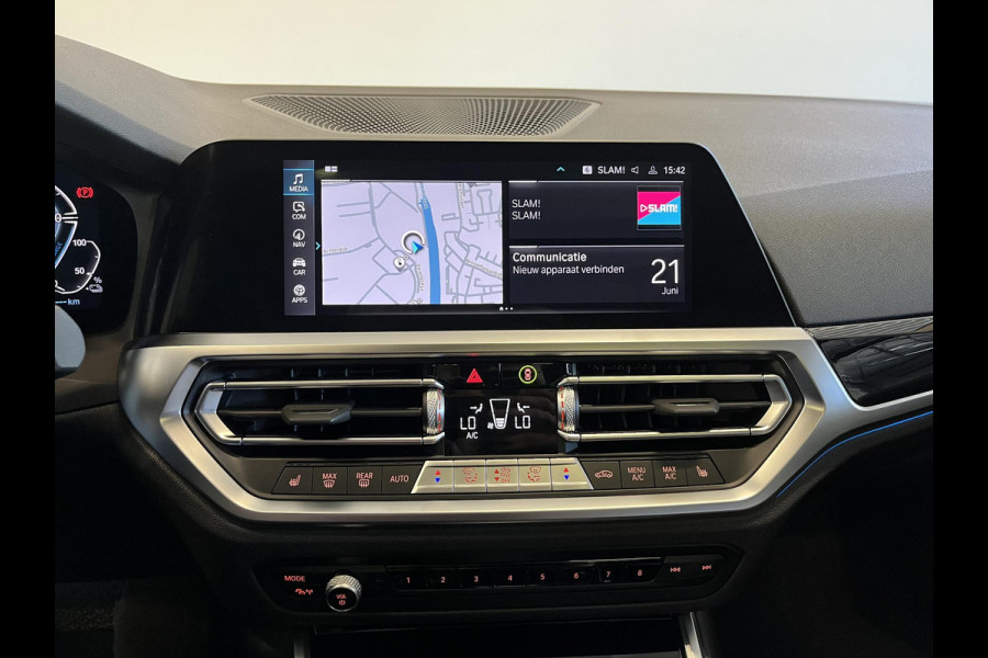 BMW 3 Serie Touring 320e Sportline Aut-8 Panoramadak Head Up Display Laser Licht Adaptive Cruise Trekhaak Leder Navi Parkeer Sensoren