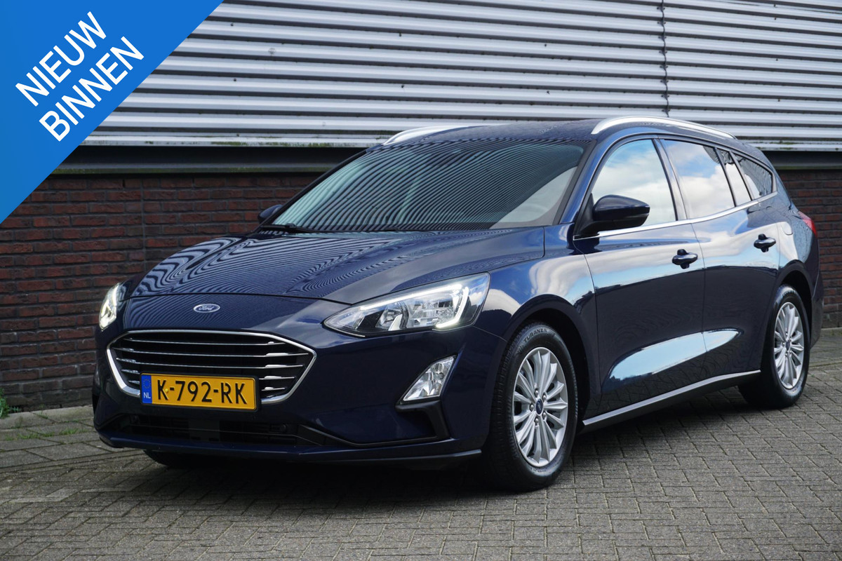 Ford FOCUS Wagon 1.0 EcoB.125PK Hybrid Titanium X Bus./Trekhaak/ Winter+Technologypack. Ford FOCUS Wagon 1.0 EcoB.125PK Hybrid Titanium X Bus./Trekhaak/ Winter+Technologypack.