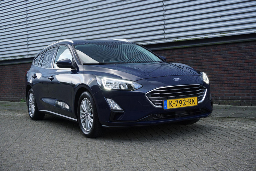 Ford FOCUS Wagon 1.0 EcoB.125PK Hybrid Titanium X Bus./Trekhaak/ Winter+Technologypack. Ford FOCUS Wagon 1.0 EcoB.125PK Hybrid Titanium X Bus./Trekhaak/ Winter+Technologypack.