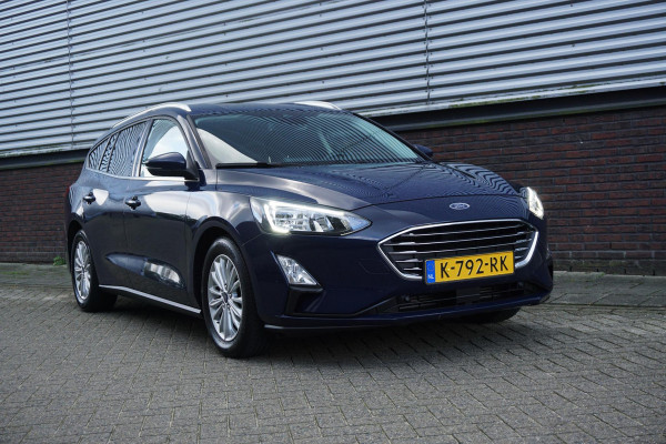 Ford FOCUS Wagon 1.0 EcoB.125PK Hybrid Titanium X Bus./Trekhaak/ Winter+Technologypack. Ford FOCUS Wagon 1.0 EcoB.125PK Hybrid Titanium X Bus./Trekhaak/ Winter+Technologypack.