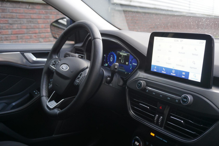 Ford FOCUS Wagon 1.0 EcoB.125PK Hybrid Titanium X Bus./Trekhaak/ Winter+Technologypack. Ford FOCUS Wagon 1.0 EcoB.125PK Hybrid Titanium X Bus./Trekhaak/ Winter+Technologypack.