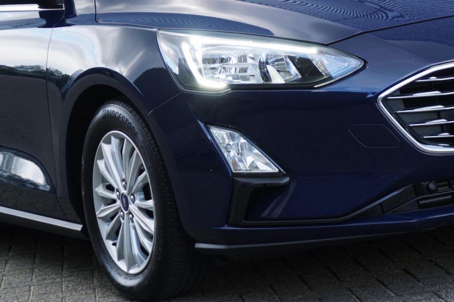 Ford FOCUS Wagon 1.0 EcoB.125PK Hybrid Titanium X Bus./Trekhaak/ Winter+Technologypack. Ford FOCUS Wagon 1.0 EcoB.125PK Hybrid Titanium X Bus./Trekhaak/ Winter+Technologypack.