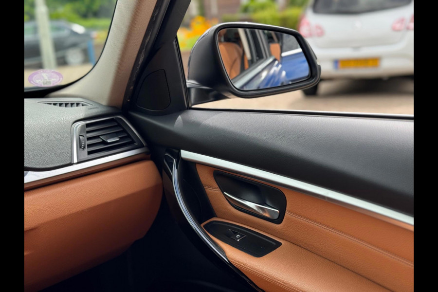 BMW 3 Serie Touring 320i Luxury 2019 AUT NAVI LEDER 1e Eig!