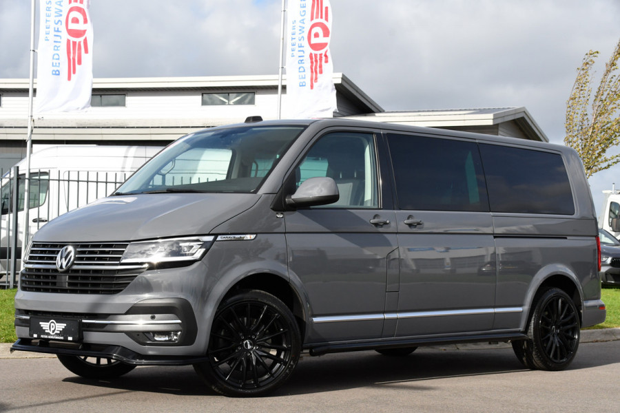 Volkswagen Transporter 2.0 TDI L2H1 DC Caravelle Full options! Adaptieve Cruise, Virtual, Carplay, LED, 204PK, 2 x Schuifdeur, Clima, Stoelverwarming, Trekhaak, Uniek! Bulli Volkswagen Transporter 2.0 TDI L2H1 DC Caravelle Full options! Adaptieve Cruise, Virtual, Carplay, LED, 204PK, 2 x Schuifdeur, Clima, Stoelverwarming, Trekhaak, Uniek! Bulli