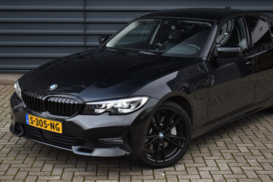 BMW 3 Serie 330e High Executive Shadow Line | ACC | 19'' M Wielen | Stuur + Stoelverwarming | CarPlay | Live Cockpit Pro | BMW 3 Serie 330e High Executive Shadow Line | ACC | 19'' M Wielen | Stuur + Stoelverwarming | CarPlay | Live Cockpit Pro |