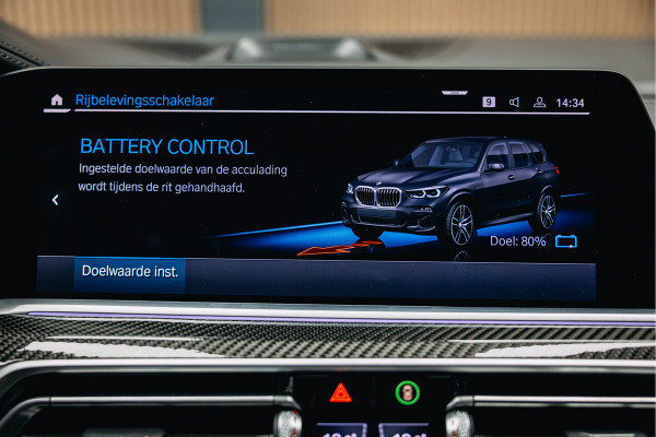 BMW X5 xDrive45e High Executive | Bowers & Wilkins | Carbon | Pano | Head-Up | Luchtvering | Trekhaak | Stoelverwarming en verkoeling |