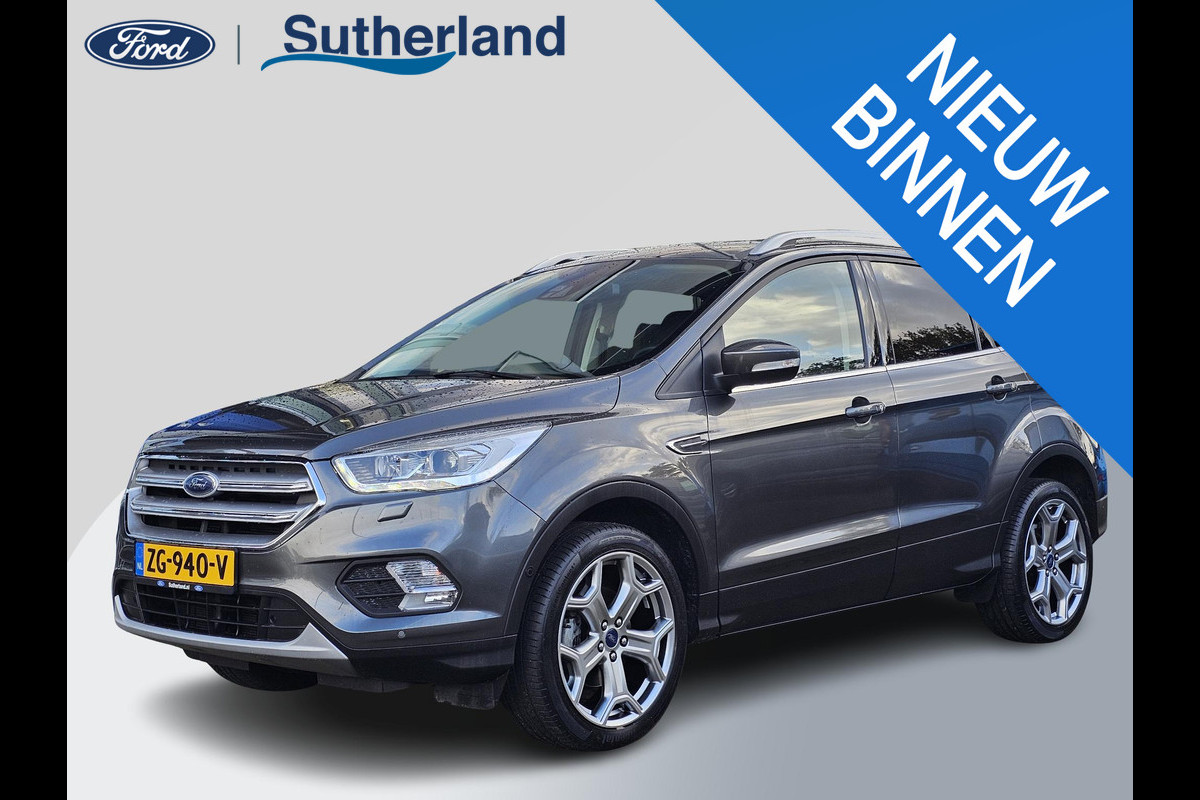 Ford Kuga 1.5 EcoBoost Titanium 150 pk | Nieuwstaat | Navigatie | PDC voor + achter | Keyless entry | Elektrisch bedienbare achterklep | Winterpack | Bi-xenon etc. Ford Kuga 1.5 EcoBoost Titanium 150 pk | Nieuwstaat | Navigatie | PDC voor + achter | Keyless entry | Elektrisch bedienbare achterklep | Winterpack | Bi-xenon etc.