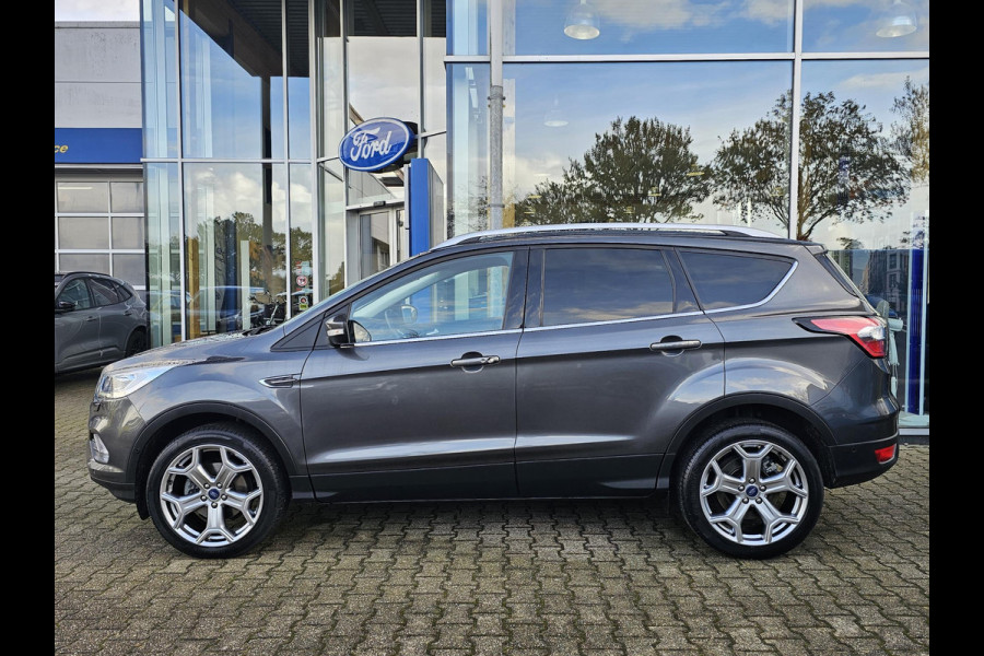 Ford Kuga 1.5 EcoBoost Titanium 150 pk | Nieuwstaat | Navigatie | PDC voor + achter | Keyless entry | Elektrisch bedienbare achterklep | Winterpack | Bi-xenon etc. Ford Kuga 1.5 EcoBoost Titanium 150 pk | Nieuwstaat | Navigatie | PDC voor + achter | Keyless entry | Elektrisch bedienbare achterklep | Winterpack | Bi-xenon etc.