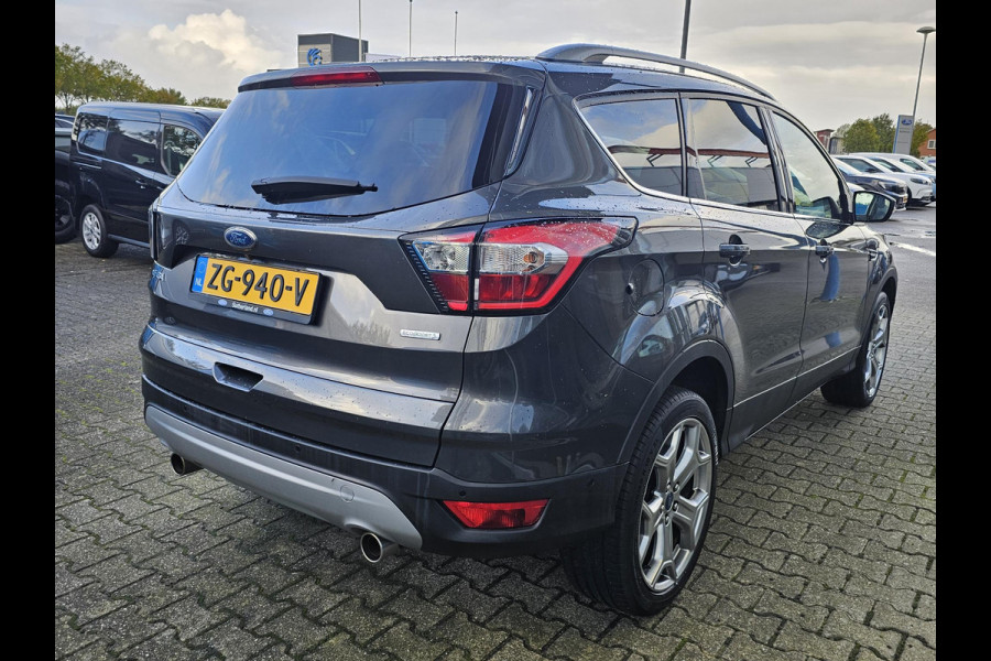 Ford Kuga 1.5 EcoBoost Titanium 150 pk | Nieuwstaat | Navigatie | PDC voor + achter | Keyless entry | Elektrisch bedienbare achterklep | Winterpack | Bi-xenon etc. Ford Kuga 1.5 EcoBoost Titanium 150 pk | Nieuwstaat | Navigatie | PDC voor + achter | Keyless entry | Elektrisch bedienbare achterklep | Winterpack | Bi-xenon etc.