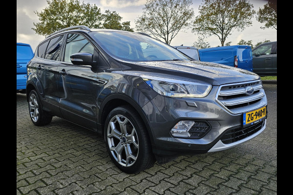 Ford Kuga 1.5 EcoBoost Titanium 150 pk | Nieuwstaat | Navigatie | PDC voor + achter | Keyless entry | Elektrisch bedienbare achterklep | Winterpack | Bi-xenon etc. Ford Kuga 1.5 EcoBoost Titanium 150 pk | Nieuwstaat | Navigatie | PDC voor + achter | Keyless entry | Elektrisch bedienbare achterklep | Winterpack | Bi-xenon etc.