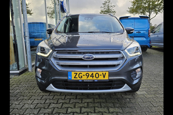 Ford Kuga 1.5 EcoBoost Titanium 150 pk | Nieuwstaat | Navigatie | PDC voor + achter | Keyless entry | Elektrisch bedienbare achterklep | Winterpack | Bi-xenon etc. Ford Kuga 1.5 EcoBoost Titanium 150 pk | Nieuwstaat | Navigatie | PDC voor + achter | Keyless entry | Elektrisch bedienbare achterklep | Winterpack | Bi-xenon etc.