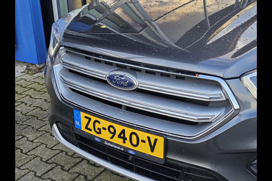 Ford Kuga 1.5 EcoBoost Titanium 150 pk | Nieuwstaat | Navigatie | PDC voor + achter | Keyless entry | Elektrisch bedienbare achterklep | Winterpack | Bi-xenon etc. Ford Kuga 1.5 EcoBoost Titanium 150 pk | Nieuwstaat | Navigatie | PDC voor + achter | Keyless entry | Elektrisch bedienbare achterklep | Winterpack | Bi-xenon etc.