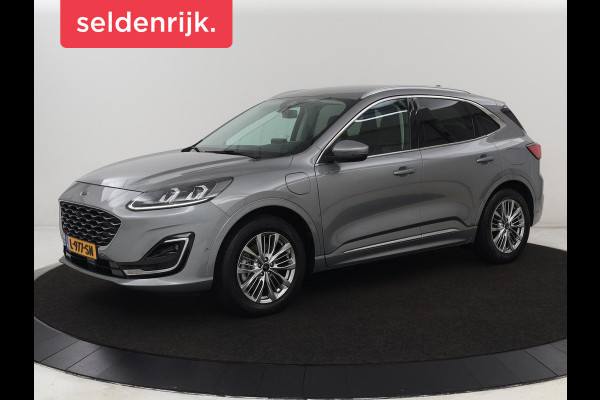 Ford Kuga 2.5 PHEV Vignale | Head-Up | Trekhaak | Adaptive cruise | Leder | 360 Camera | Stoelverwarming | Digital Cockpit | Carplay | Dodehoek detectie | Navigatie | Keyless | Achterbankverwarming | Plug In Ford Kuga 2.5 PHEV Vignale | Head-Up | Trekhaak | Adaptive cruise | Leder | 360 Camera | Stoelverwarming | Digital Cockpit | Carplay | Dodehoek detectie | Navigatie | Keyless | Achterbankverwarming | Plug In