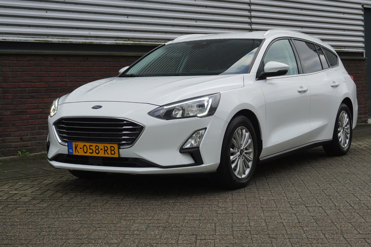 Ford FOCUS Wagon 1.0 EcoB. 125PK Hybrid Titanium X Business/Camera/ Digitaal Dashboard Ford FOCUS Wagon 1.0 EcoB. 125PK Hybrid Titanium X Business/Camera/ Digitaal Dashboard