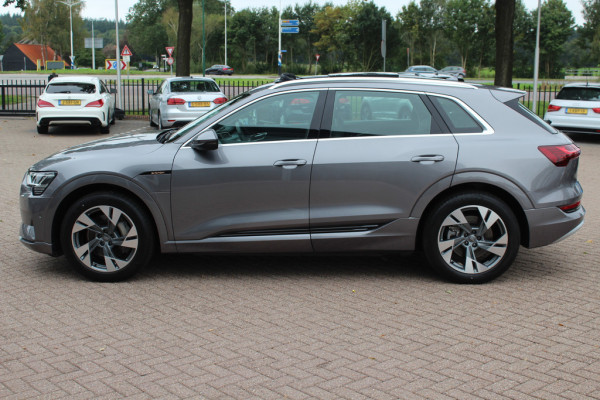 Audi e-tron e-tron 50 quattro Launch edition plus 71 kWh / Panoramadak / Luchtvering / ACC / Virtual Cockpit / 20'' / Navigatie / Leder Audi e-tron e-tron 50 quattro Launch edition plus 71 kWh / Panoramadak / Luchtvering / ACC / Virtual Cockpit / 20'' / Navigatie / Leder